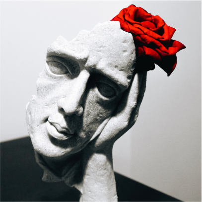 A broken pale sculpture of a figure resting it's head on its left hand with a red rose perched just above, resting on the top
